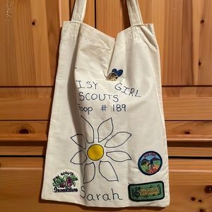 Vintage 90’s Daisy Girl Scouts bag with patches and pin.